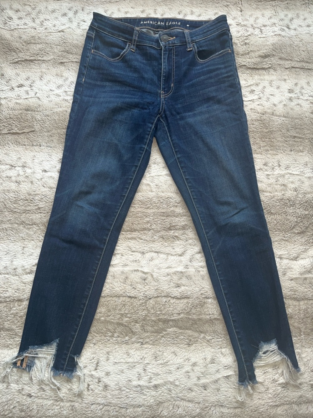 American Eagle Outfitters Women's Indigo Skinny Jeans with Frayed Ankles